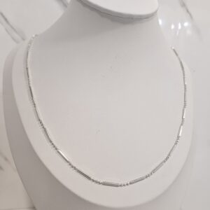 Cadena palito y punto