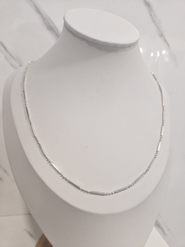 Cadena palito y punto