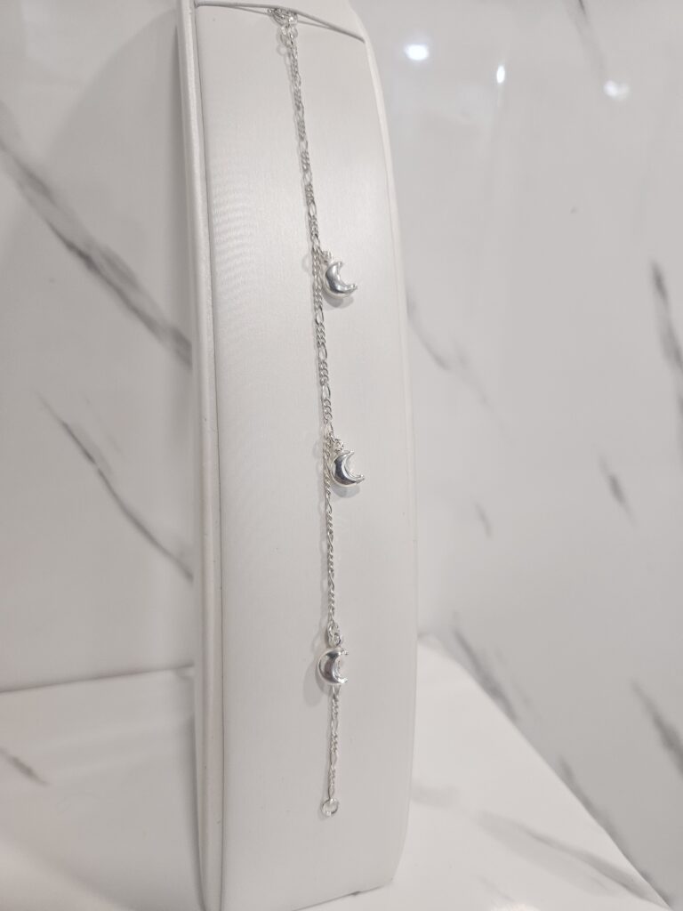 Pulsera figaro con media lunas inflada
