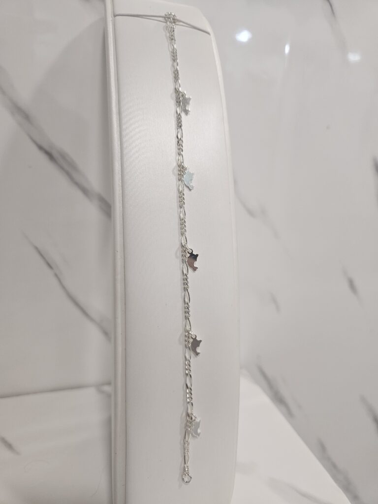 Pulsera figaro con delfines colgantes