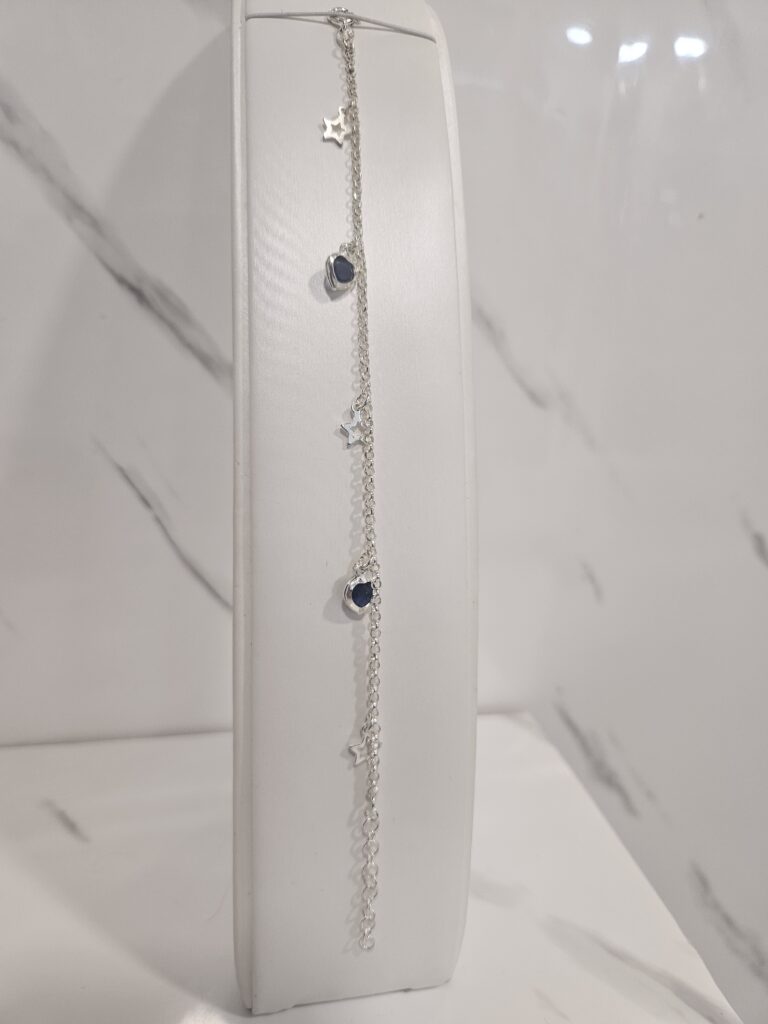 Pulsera figaro con estrellas y circones de corazon zafiro