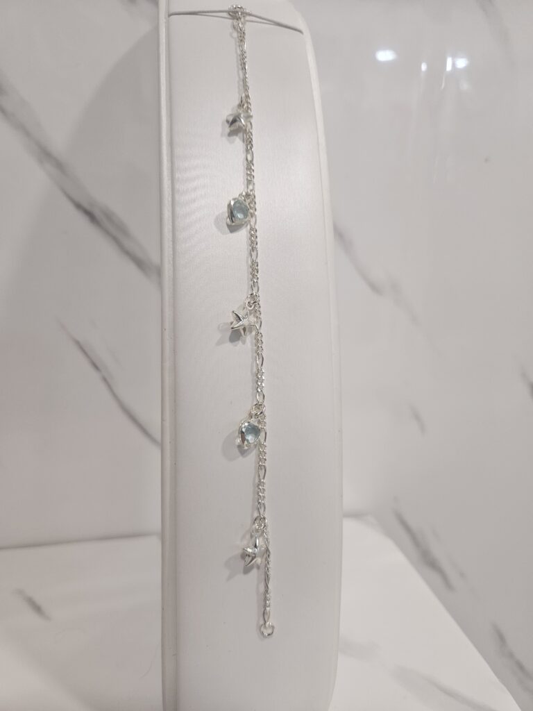 Pulsera figaro con estrellas y circones de corazon aguamarina