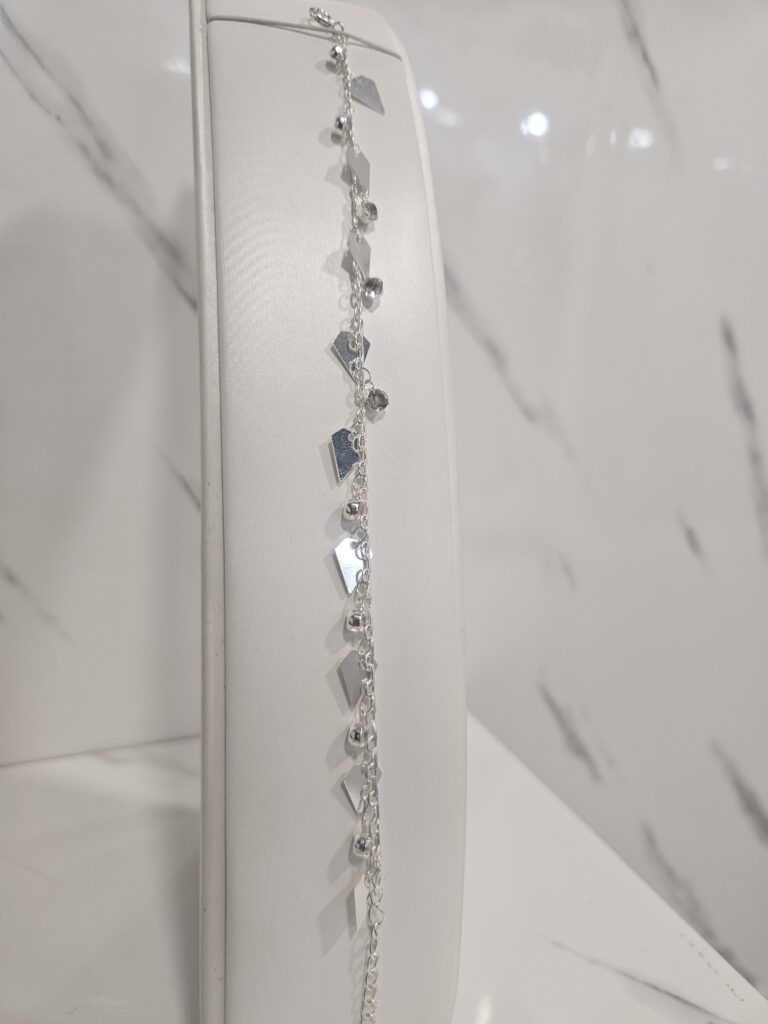 Pulsera con rombos y circones colgantes