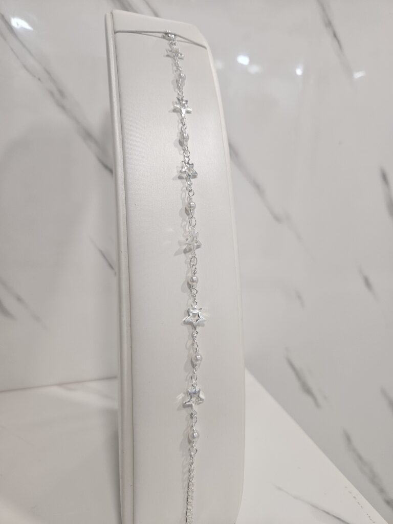 Pulsera estrellas y perlas