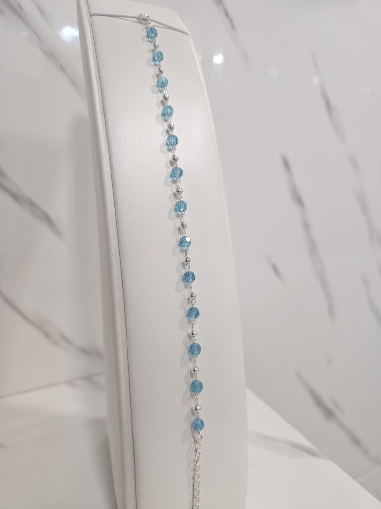 Pulsera esferas celestes con alargue