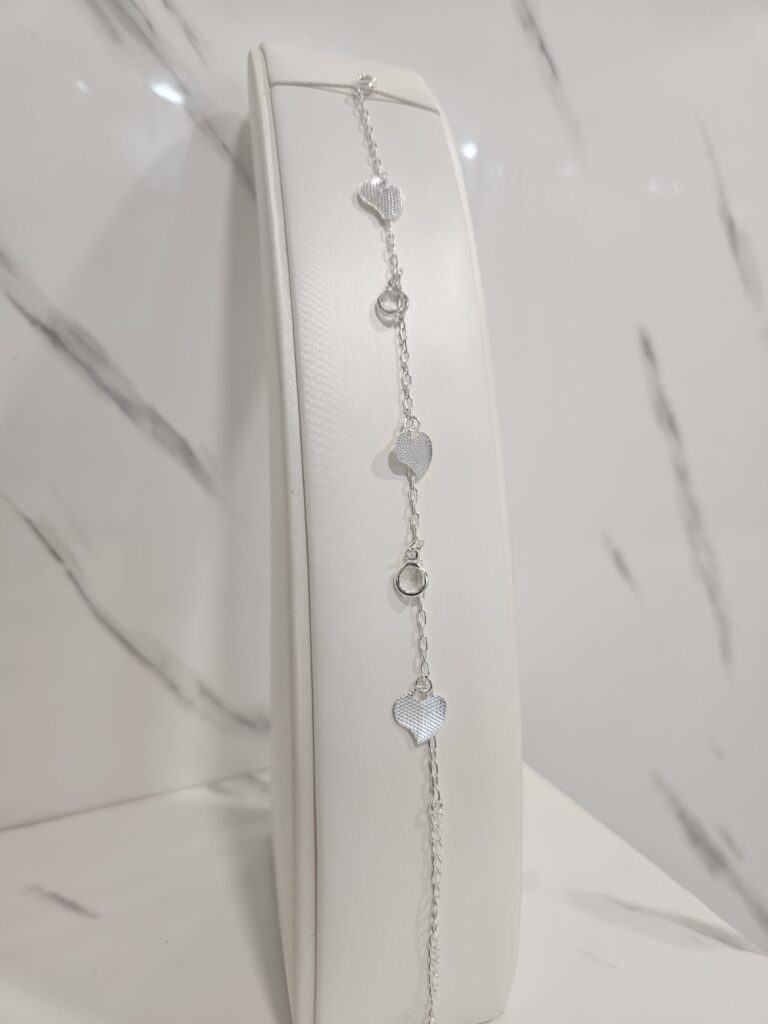 Pulsera corazones y circones colgantes con alargue