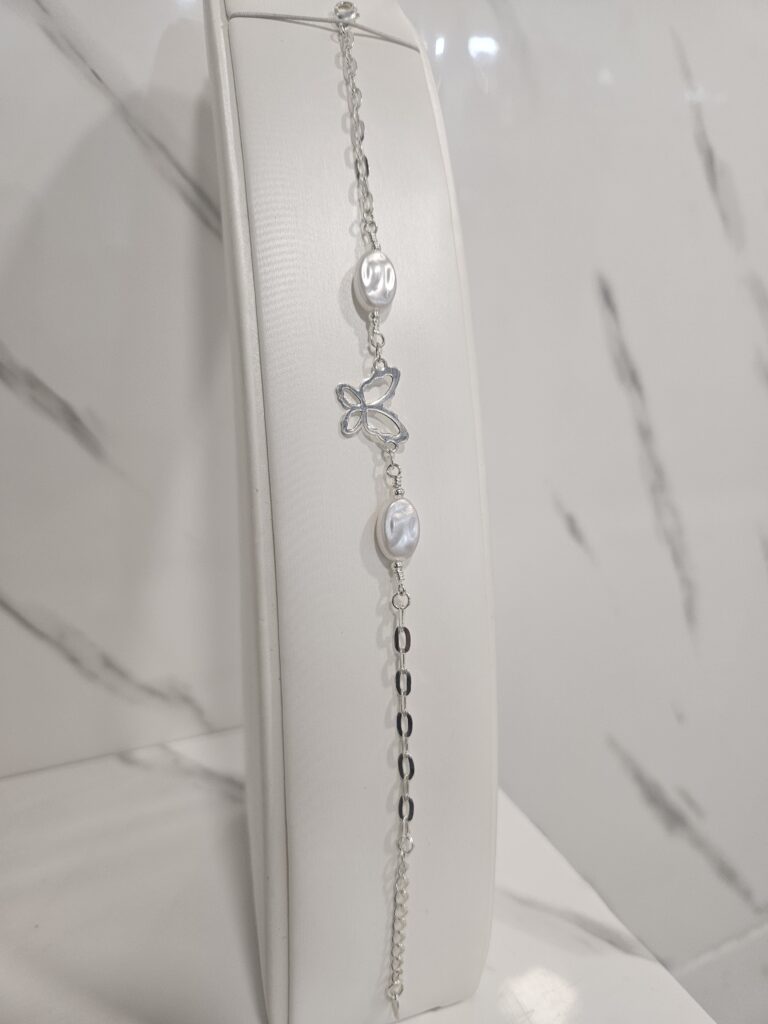 Pulsera perlas y mariposas con alargue