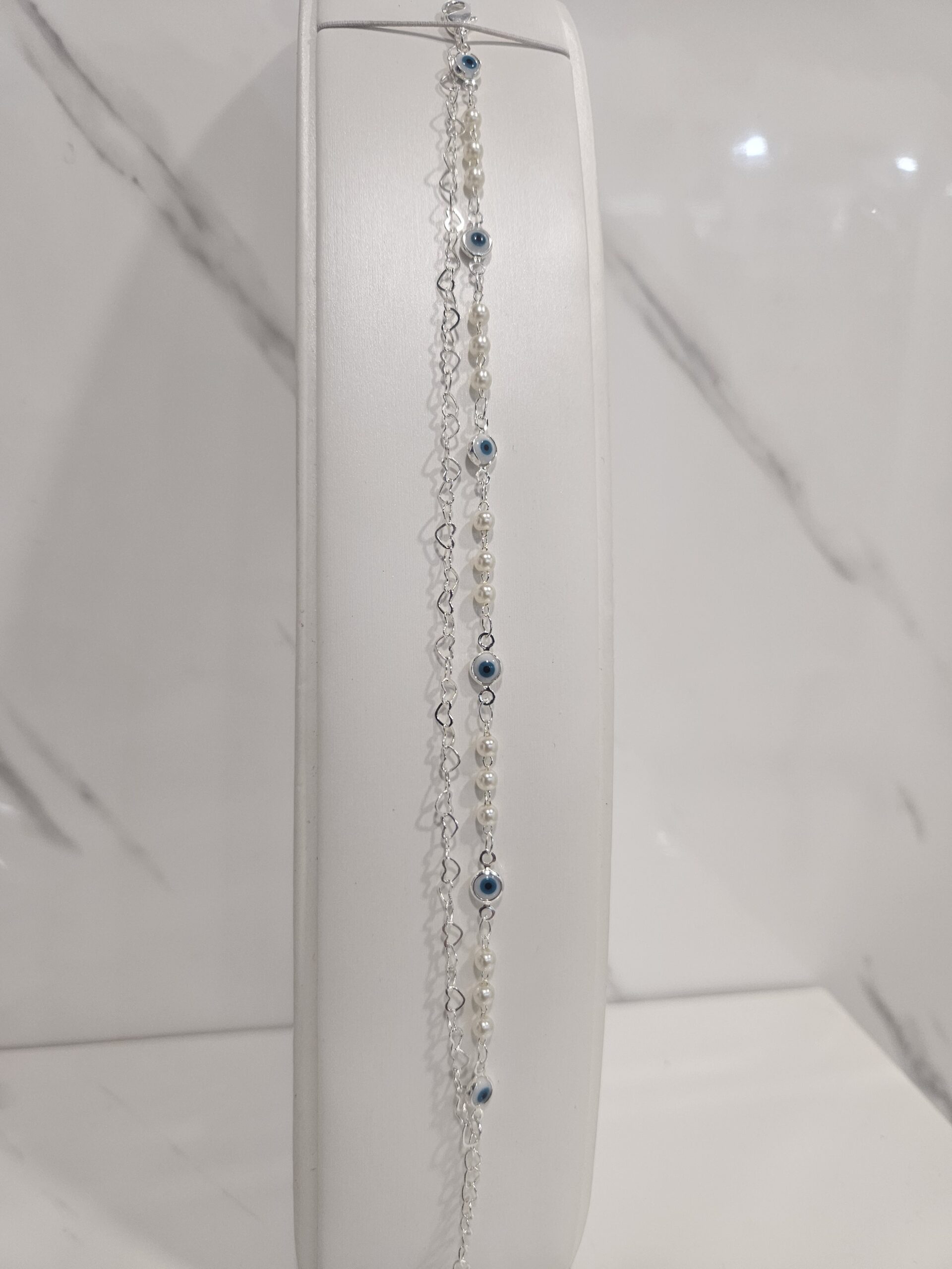Pulsera doble ojos turco con perlas y corazones entrelazados